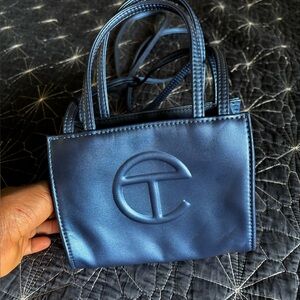 Telfar Blue Mini cobalt blue vegan leather bag 
Metallic dark blue